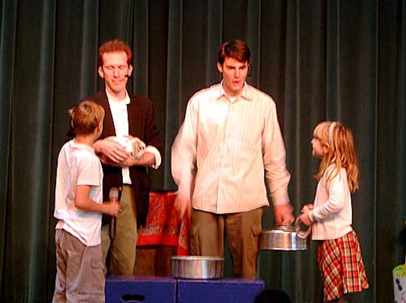 Rabbit magic routine with young volunteers