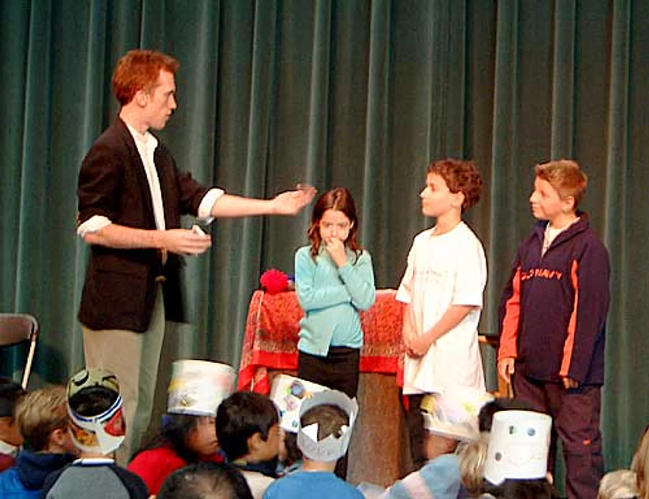 Card trick lineup with young volunteers