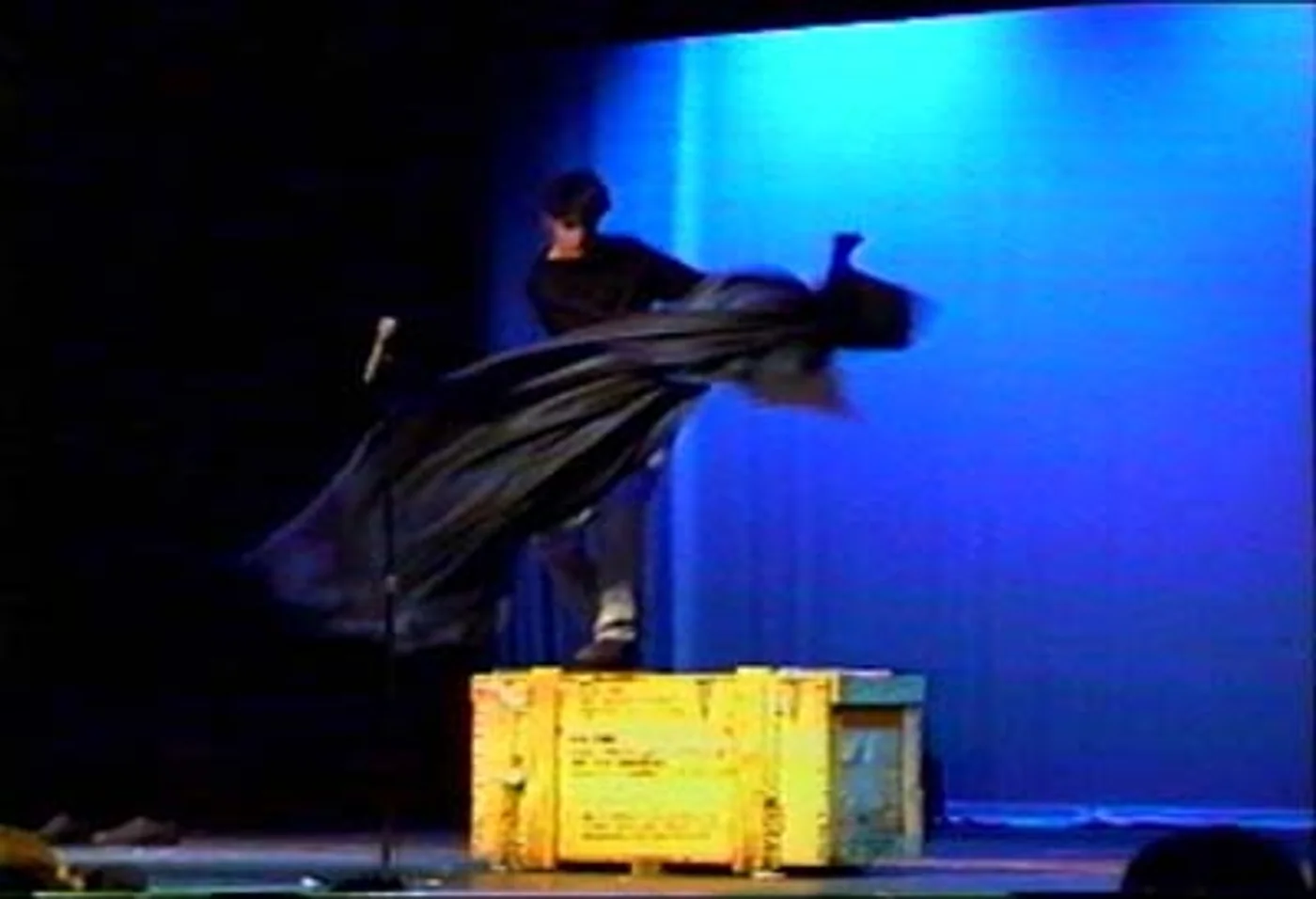 The sheet caught as the performers exchange places