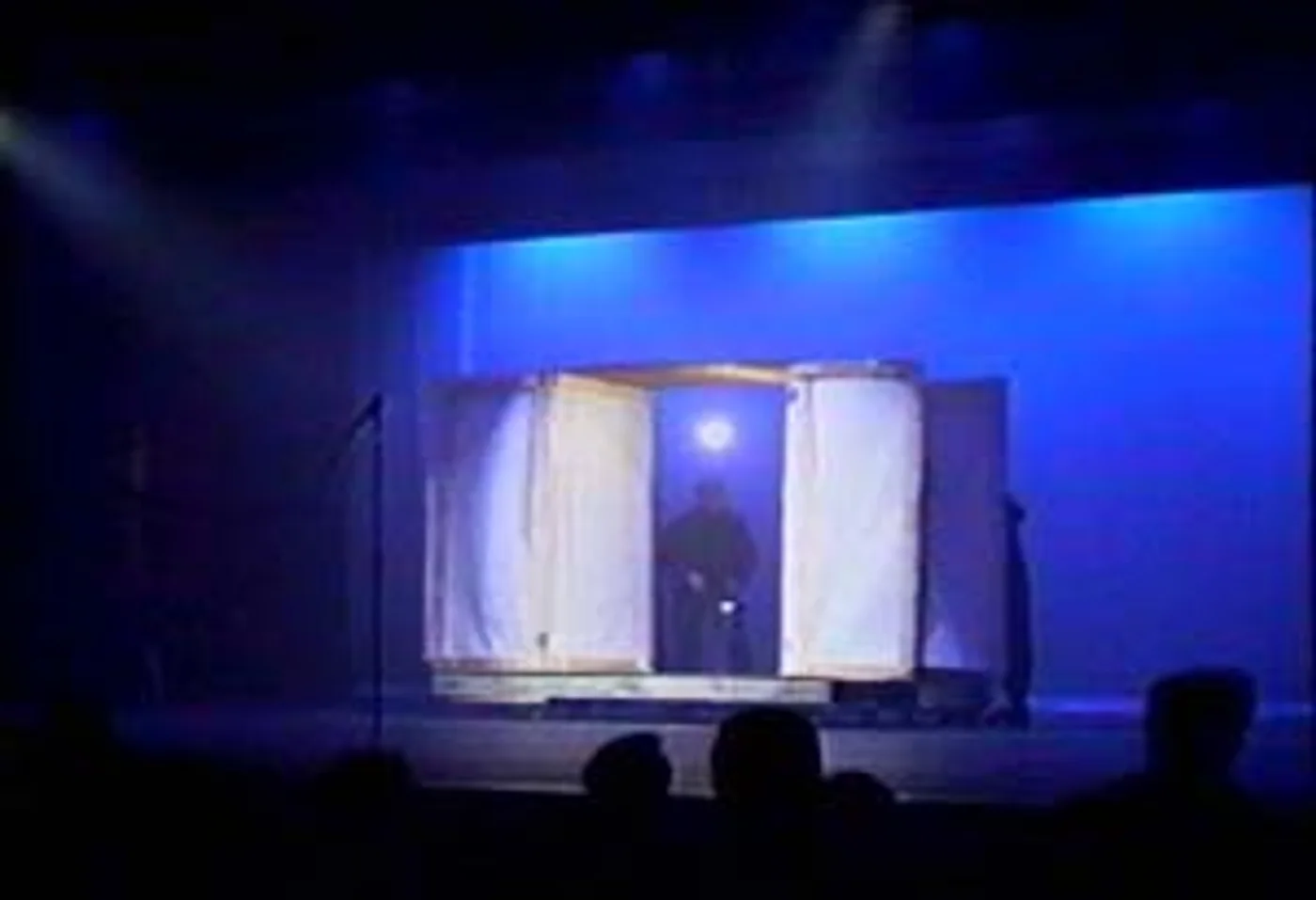 Shadow box with figure forming